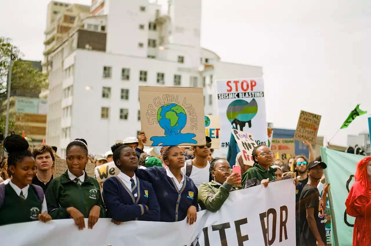 Photos: Hundreds march to Parliament over climate crisis