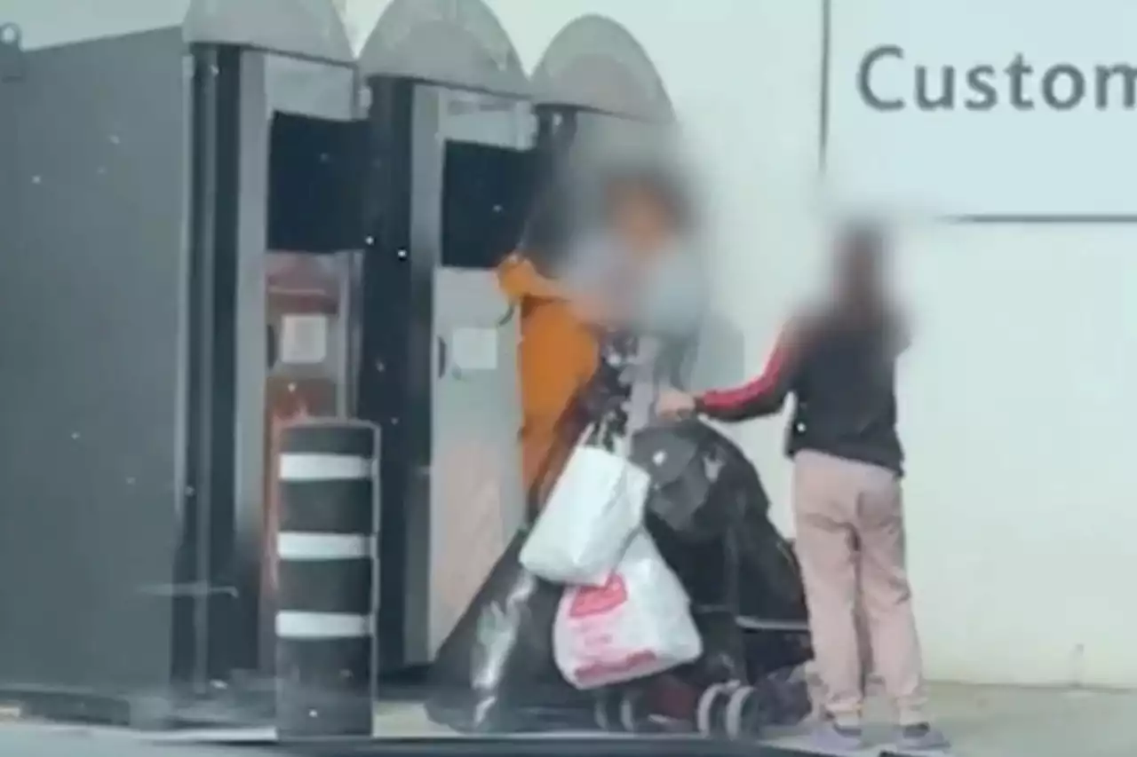 Watch as woman takes clothes out of a charity bin with metal rod - who's right?