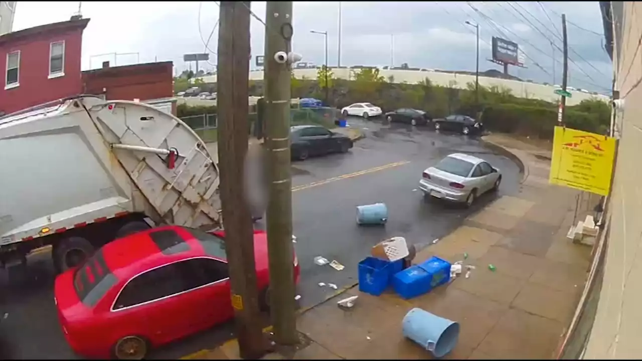 Port Richmond residents upset after video shows sanitation workers tossing trash bins