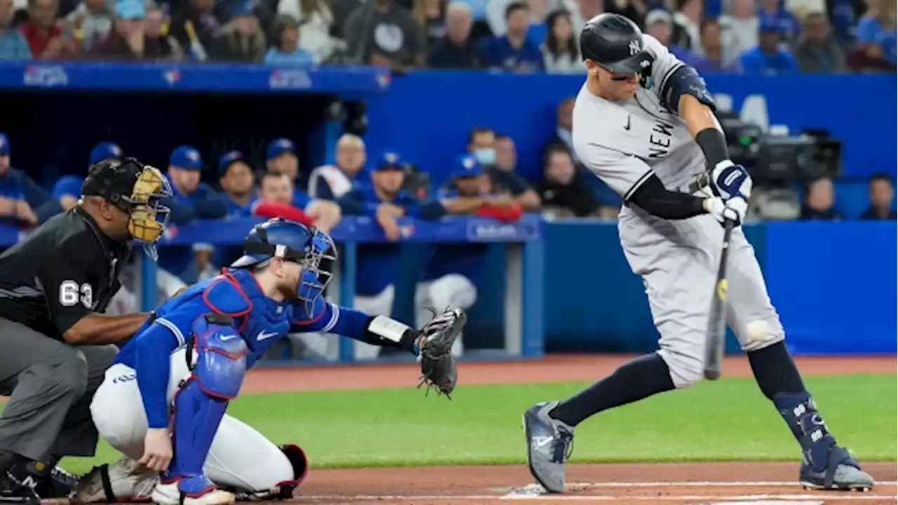 Fans pack outfield seating for a chance at catching Aaron Judge's historic home run