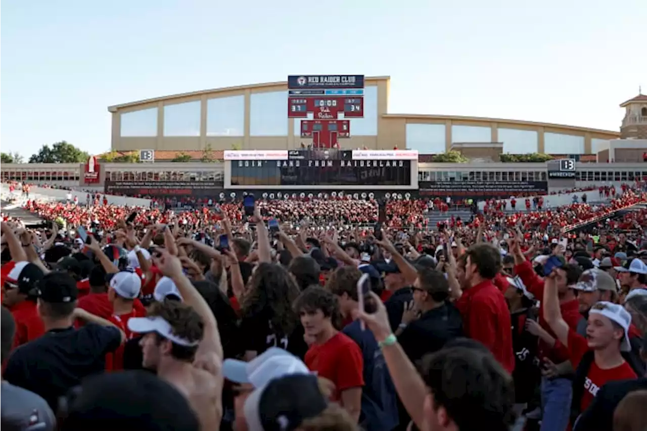 Texas Tech fined for storming field after OT win against Texas; Longhorns player shoved by fan