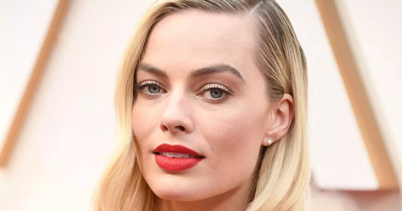 Margot Robbie ditches light blonde hair for a moody 'mushroom bronde' colour