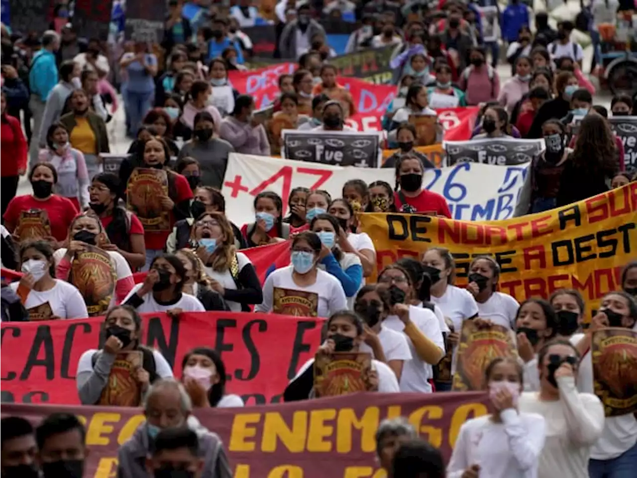 Families of Mexico's missing students march on anniversary