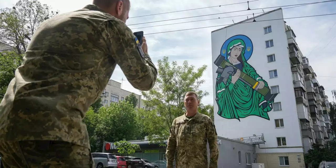 Ukraine’s Internet Army of ‘NAFO Fellas’ Fights Russian Trolls and Rewards Donors With Dogs