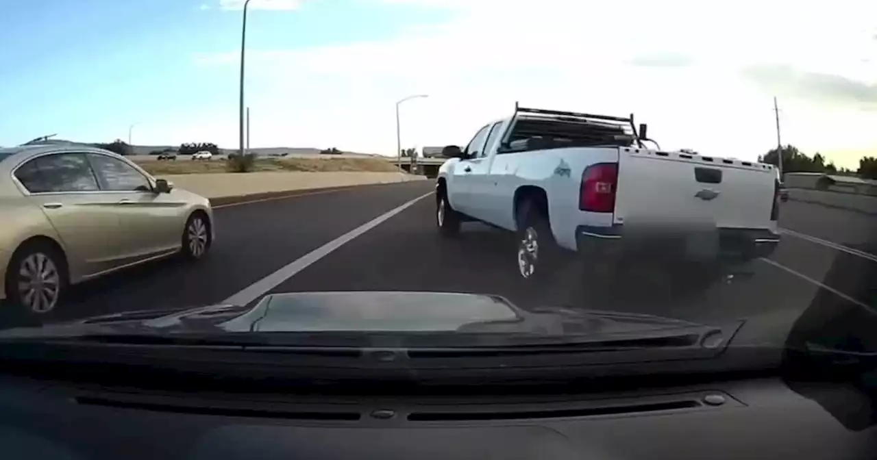 Wild video shows truck nearly causing accident on I-15