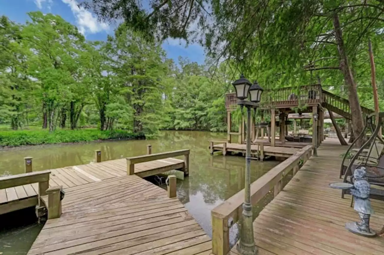 PHOTOS: Go inside this surprising waterfront home on the market in Kingwood for $770K