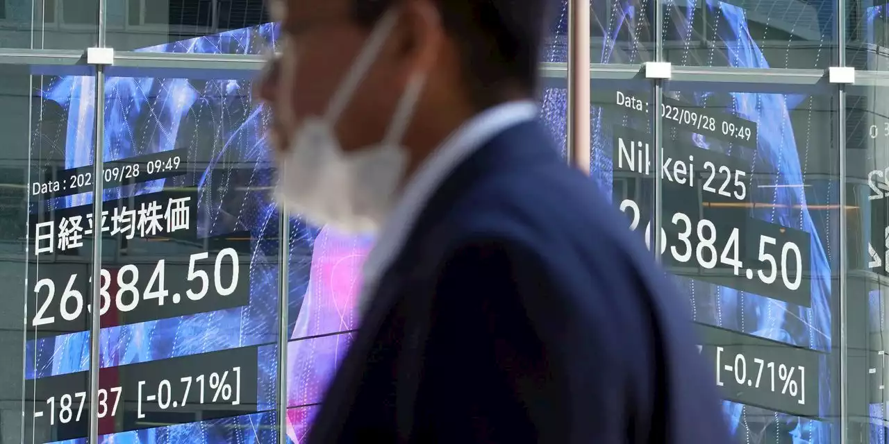 Asian markets sharply lower after wobbly day on Wall Street