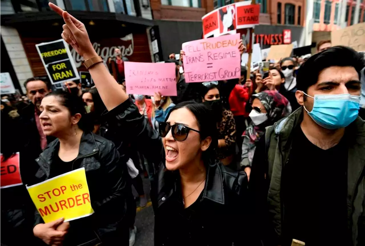 ‘Every one of us was a Mahsa’: Iranians in Canada cut hair at women’s rights rallies – Terrace Standard