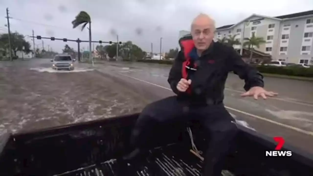 Sunrise cameraman drops his camera on live TV to help rescue families stuck in Hurricane Ian