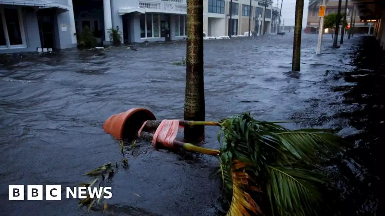 Hurricane Ian: Cities flooded and power cut as storm crosses Florida