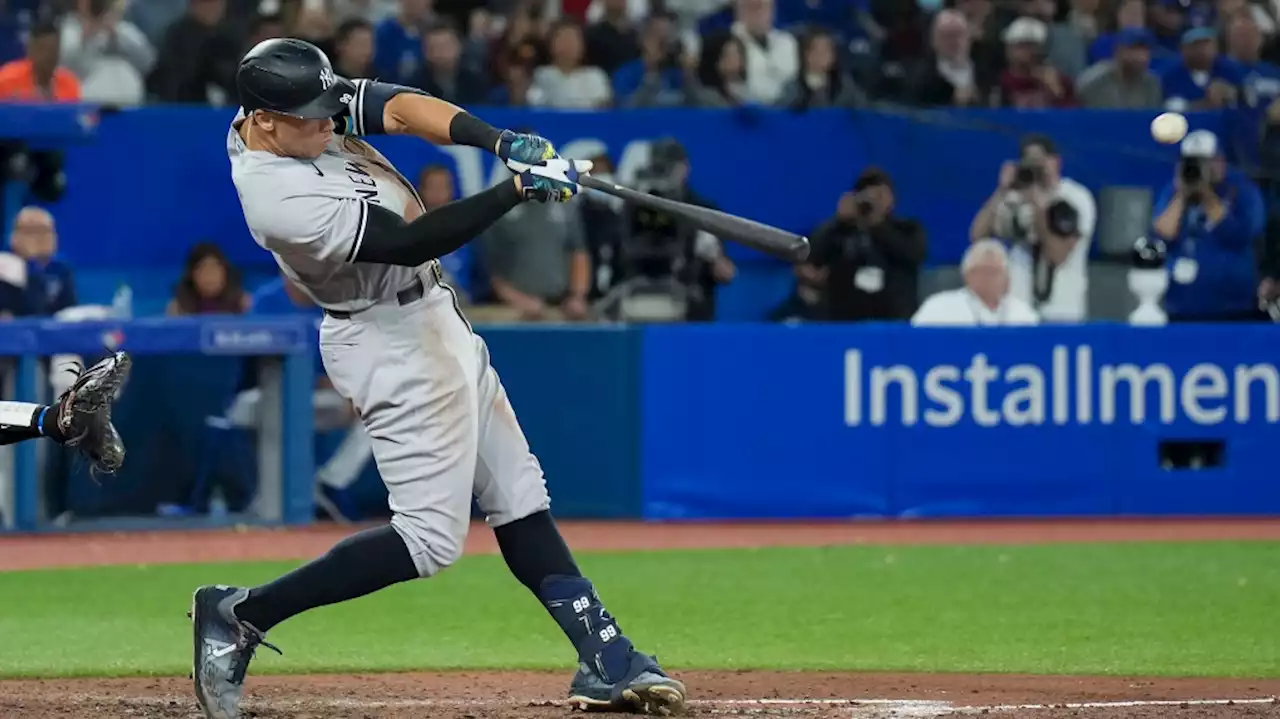 Yankees' Aaron Judge hits 61st home run of the season in Toronto, ties AL record