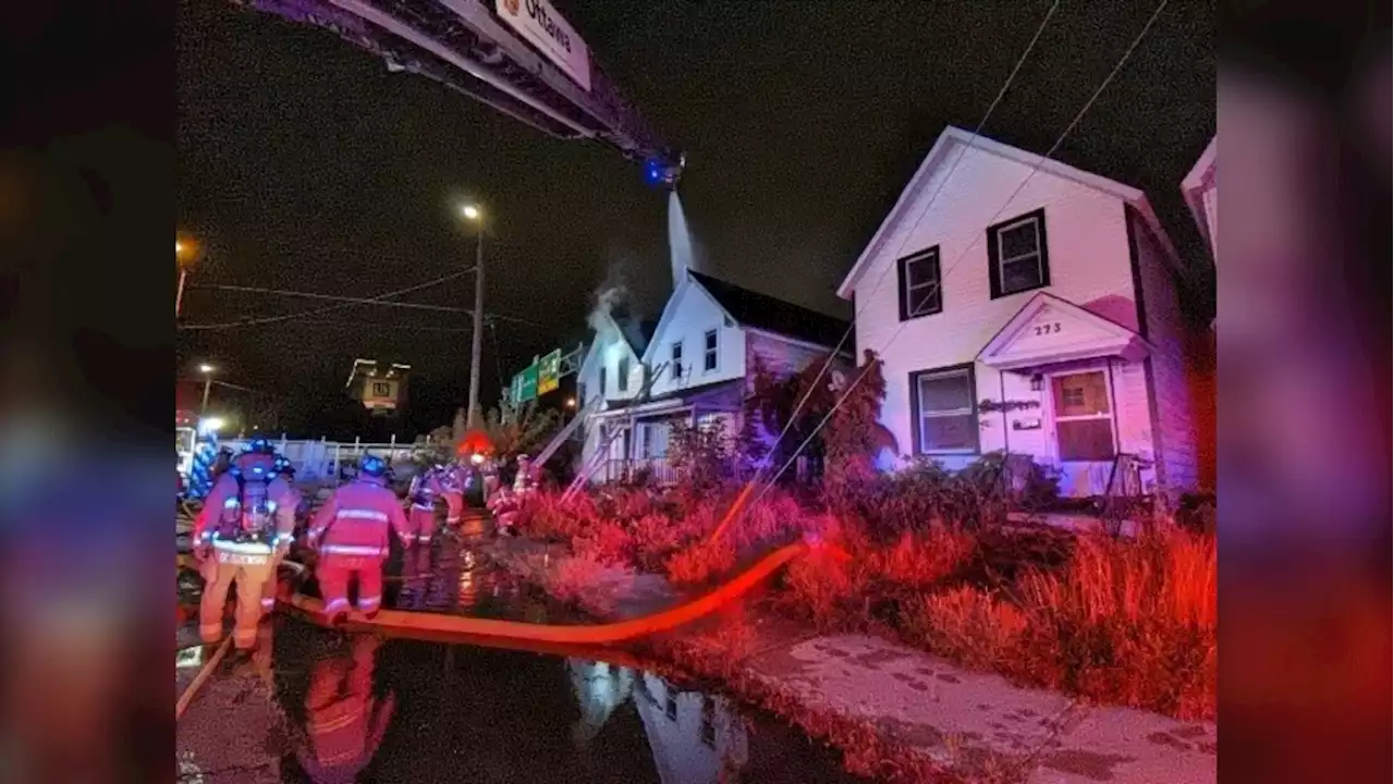 Firefighter injured battling blaze in neighbouring Ottawa homes