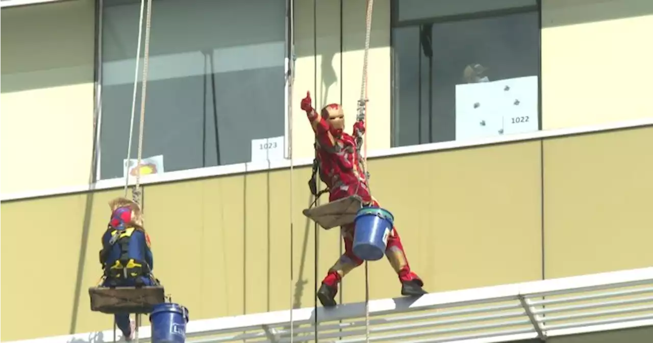 Annual superhero window wash brightens day at Kingston General Hospital - Kingston | Globalnews.ca