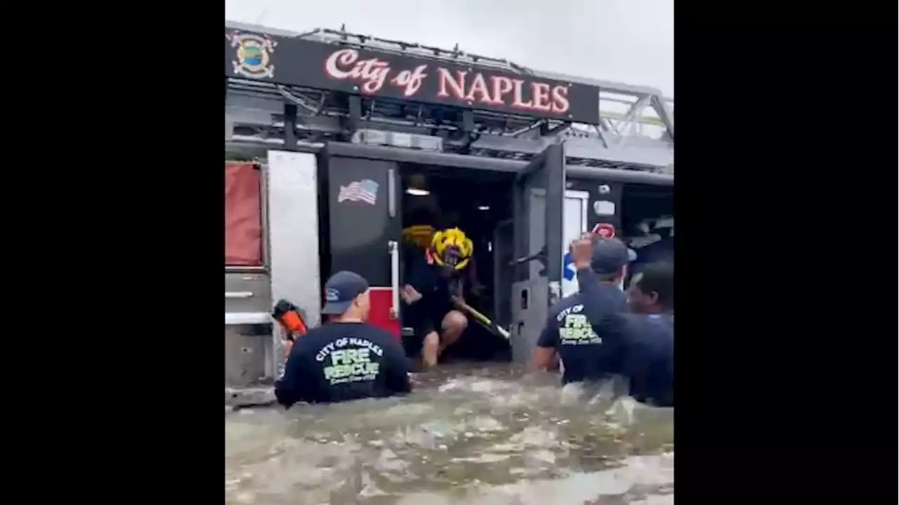 After Rescuing Residents From Floods, Florida Firefighters Return to Station Under Water