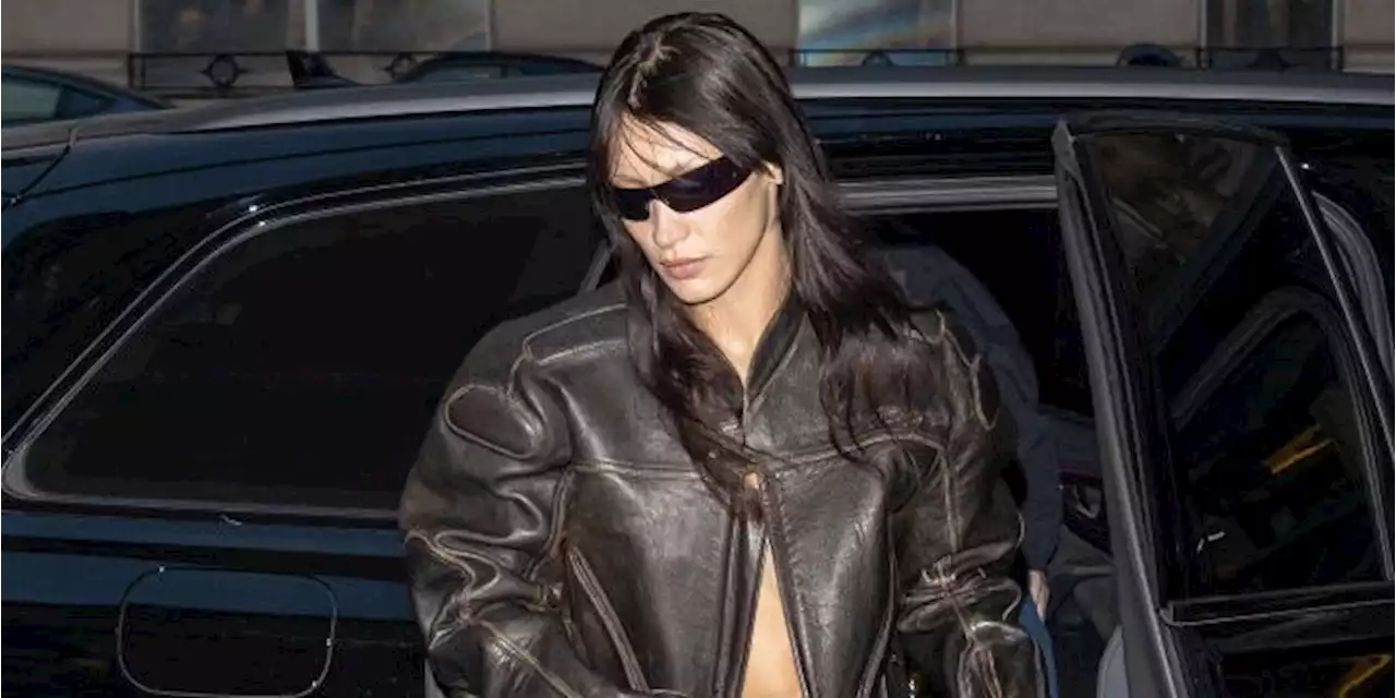 Bella Hadid Goes Braless Underneath an Oversized Biker Trench Coat