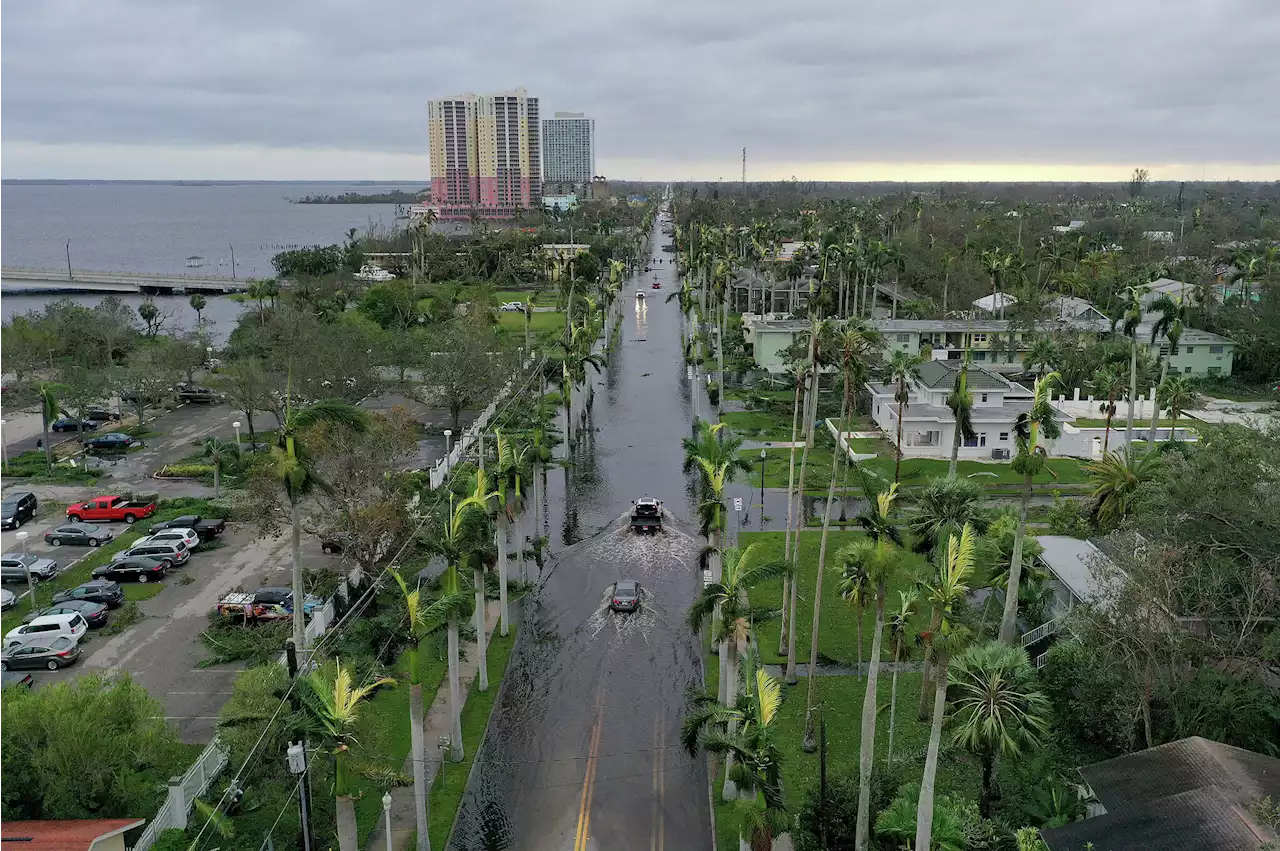 Causeway crumbles into gulf as Hurricane Ian batters Florida