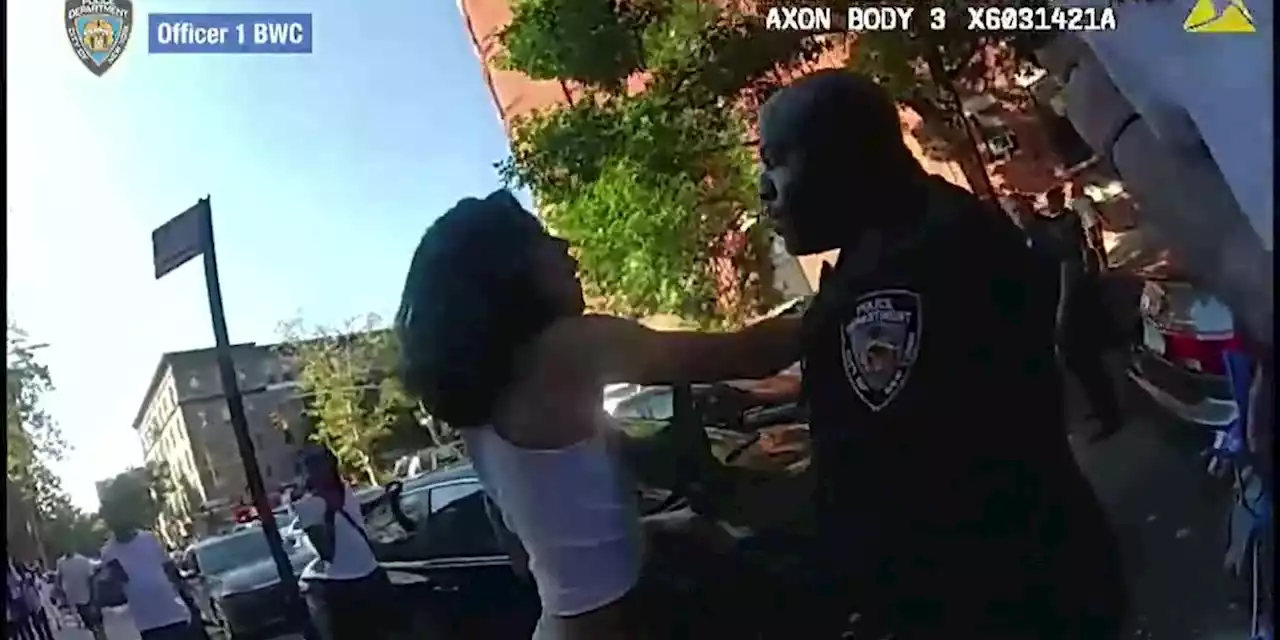 WATCH: NYPD officer shoves woman while taking man into custody