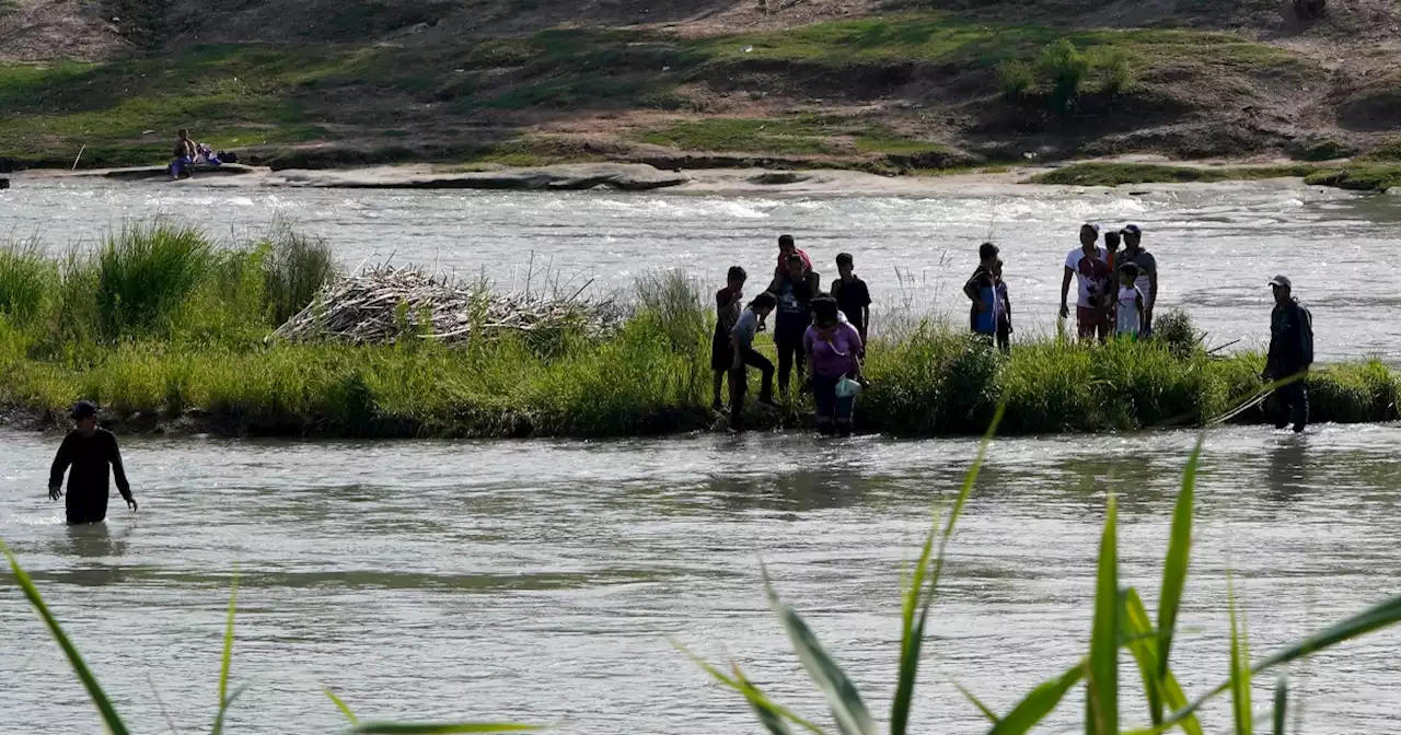 Eight migrants died and dozens more were rescued trying to cross the Rio Grande in Texas