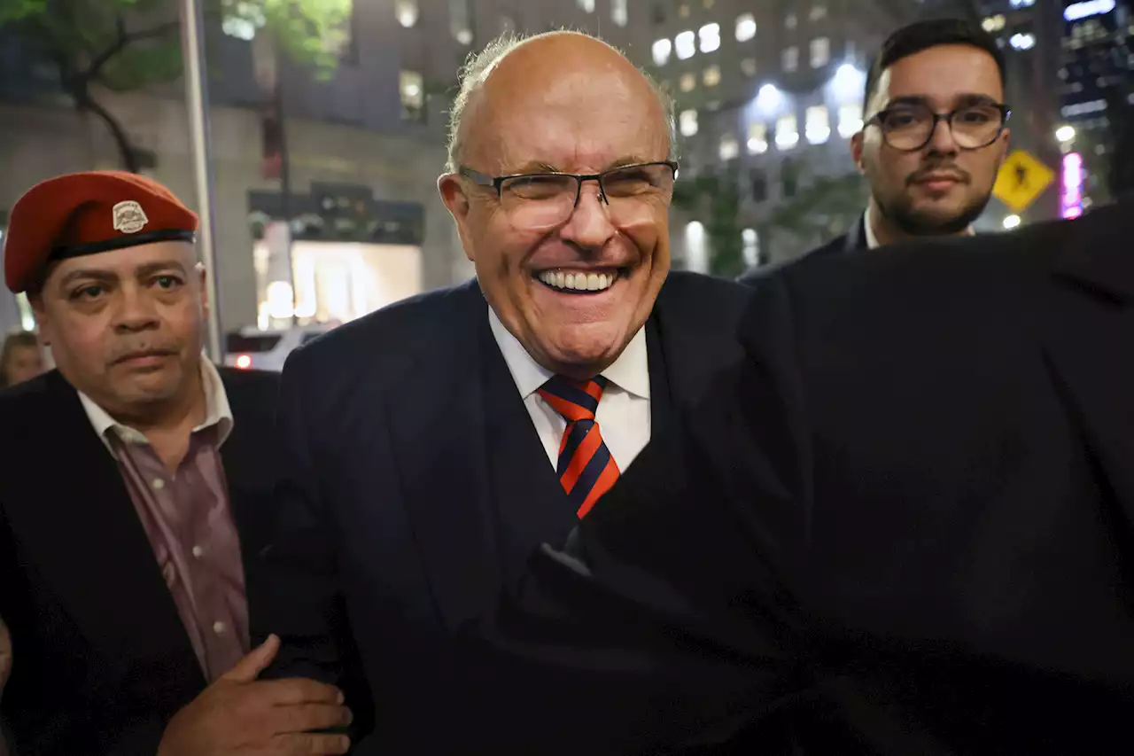 Rudy Giuliani parties in Times Square despite legal woes