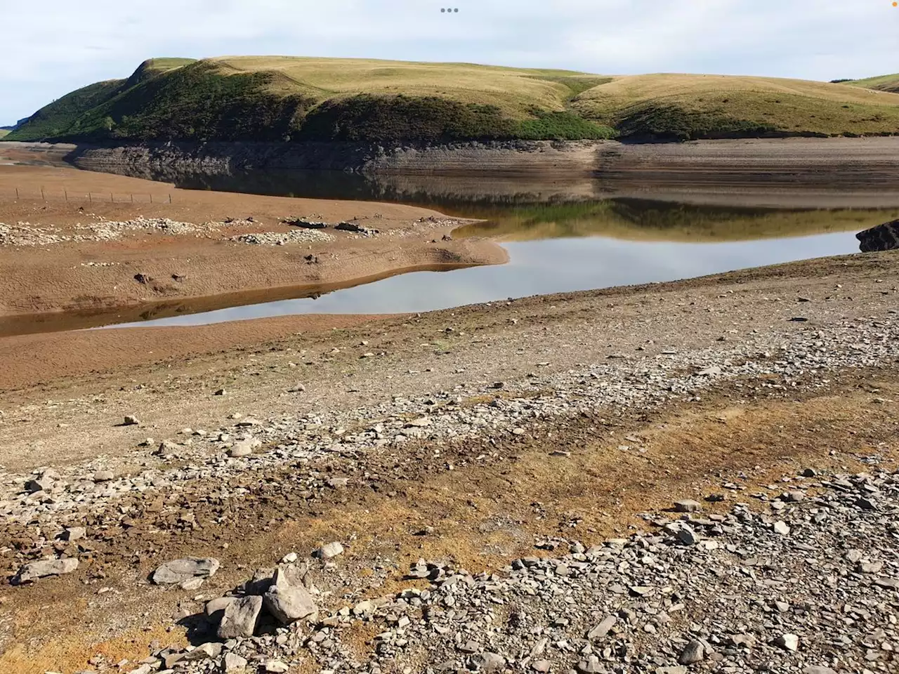 'More than just a weekend's rain' is needed as photos reveal half-empty reservoir