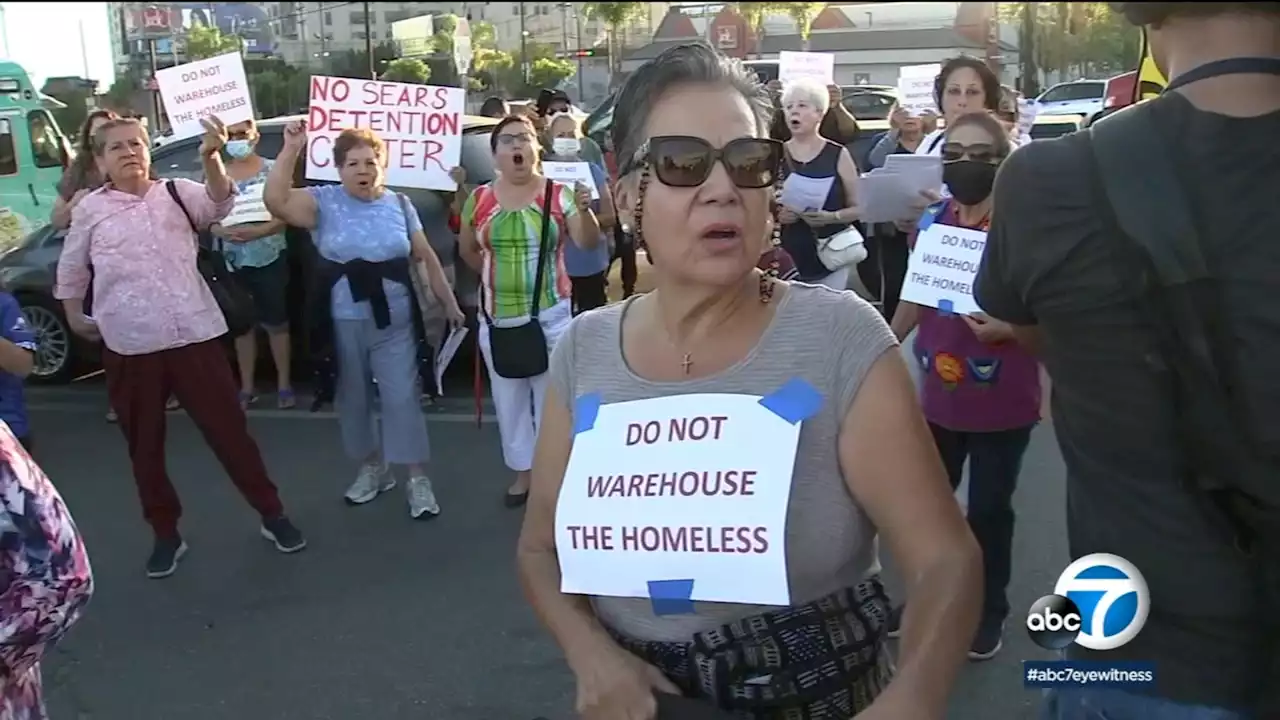 Boyle Heights residents protest plan to turn Sears tower into homeless center