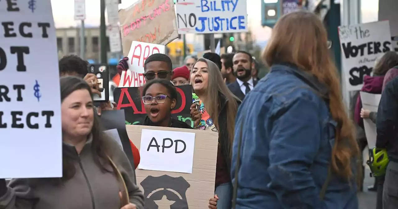 Protesters rally outside Anchorage police headquarters to decry body camera delays