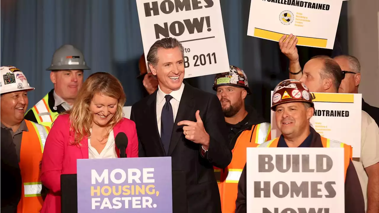 California Gov. Gavin Newsom signs a wave of housing bills