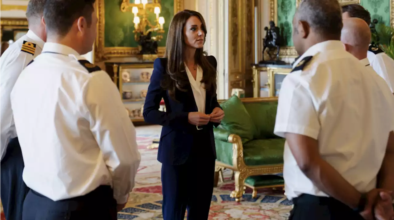 Princess Kate Stunned in a Navy Suit While Meeting Members of the Royal Navy