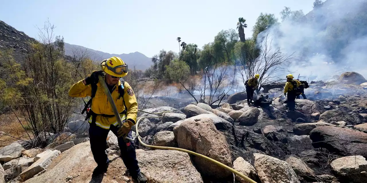 California wildfire destroys 100 homes, other buildings