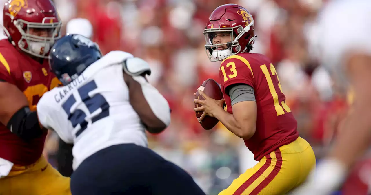 No. 14 USC routs Rice 66-14 in big debuts by Williams, Riley