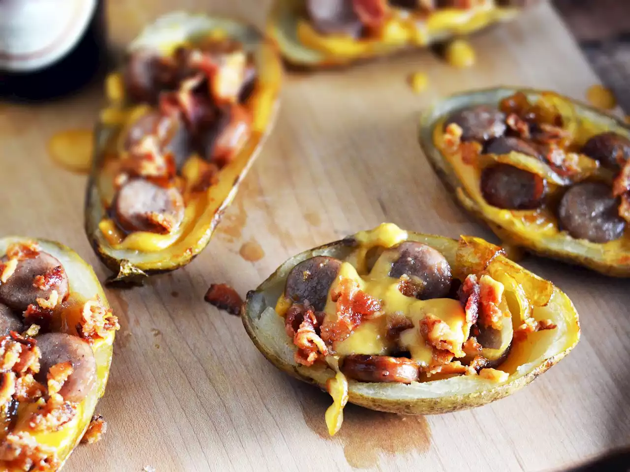 Upgrade Your Potato Skins With Beer-Cooked Onions, Beer-Simmered Brats, Beer Cheese, and Bacon