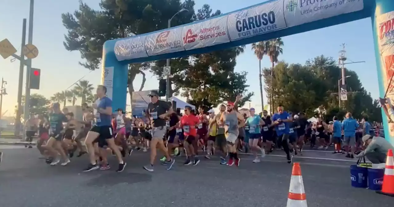 Runners 'Conquer the Bridge' and the heat at annual Labor Day race