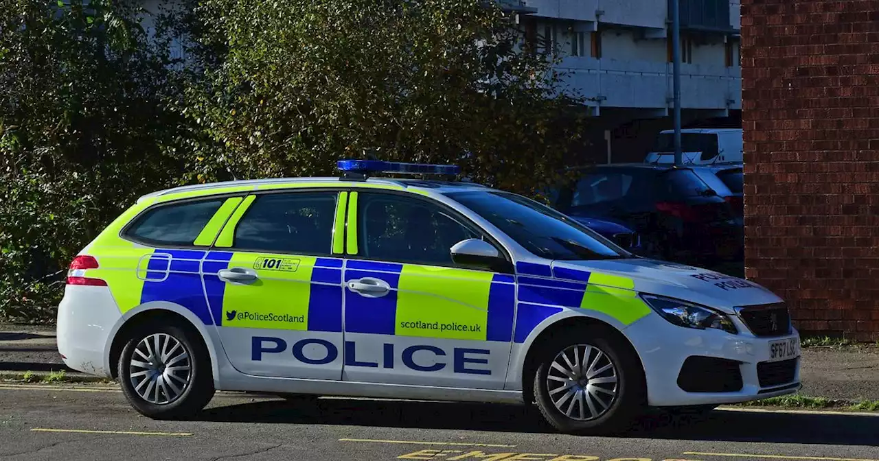 Youths break into Glasgow police car and nick uniform as cops carry out duties