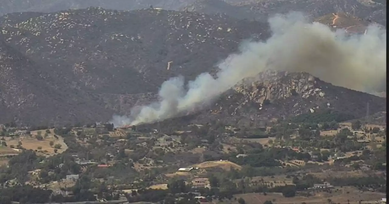 Firefighters attack brush fire north of Fallbrook