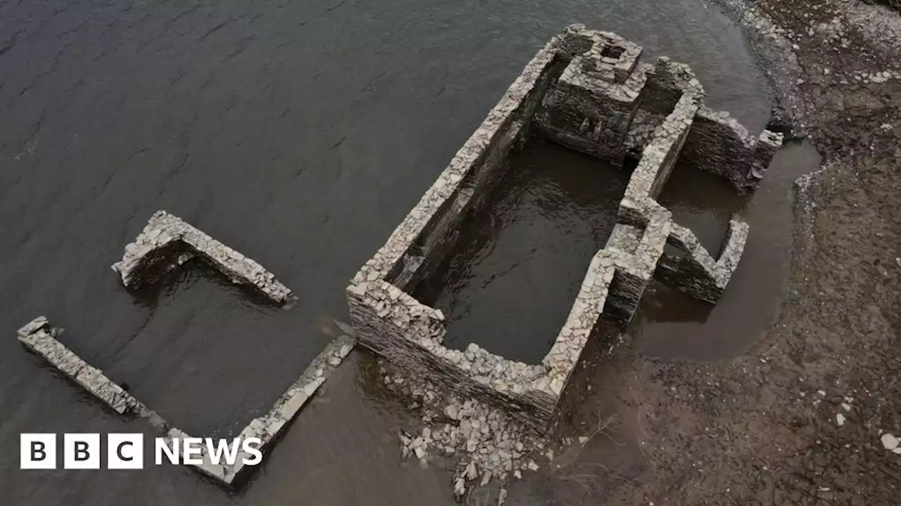 Powys: Farm flooded for reservoir emerges following dry spell