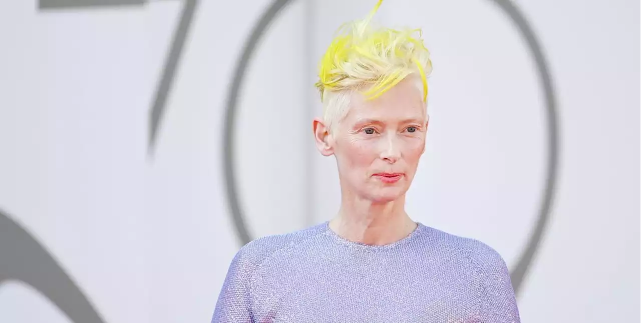 Tilda Swinton debuts neon hair transformation at Venice Film Festival