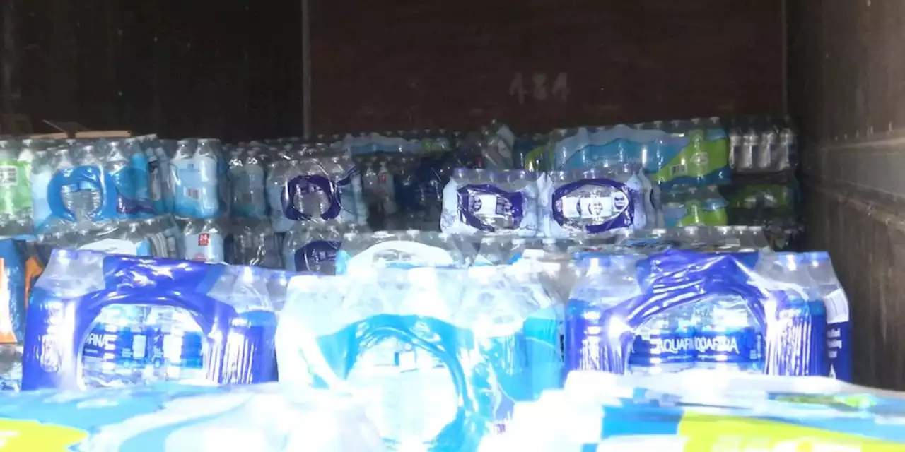 Mobile man helping Jackson residents with dozens of cases of bottled water