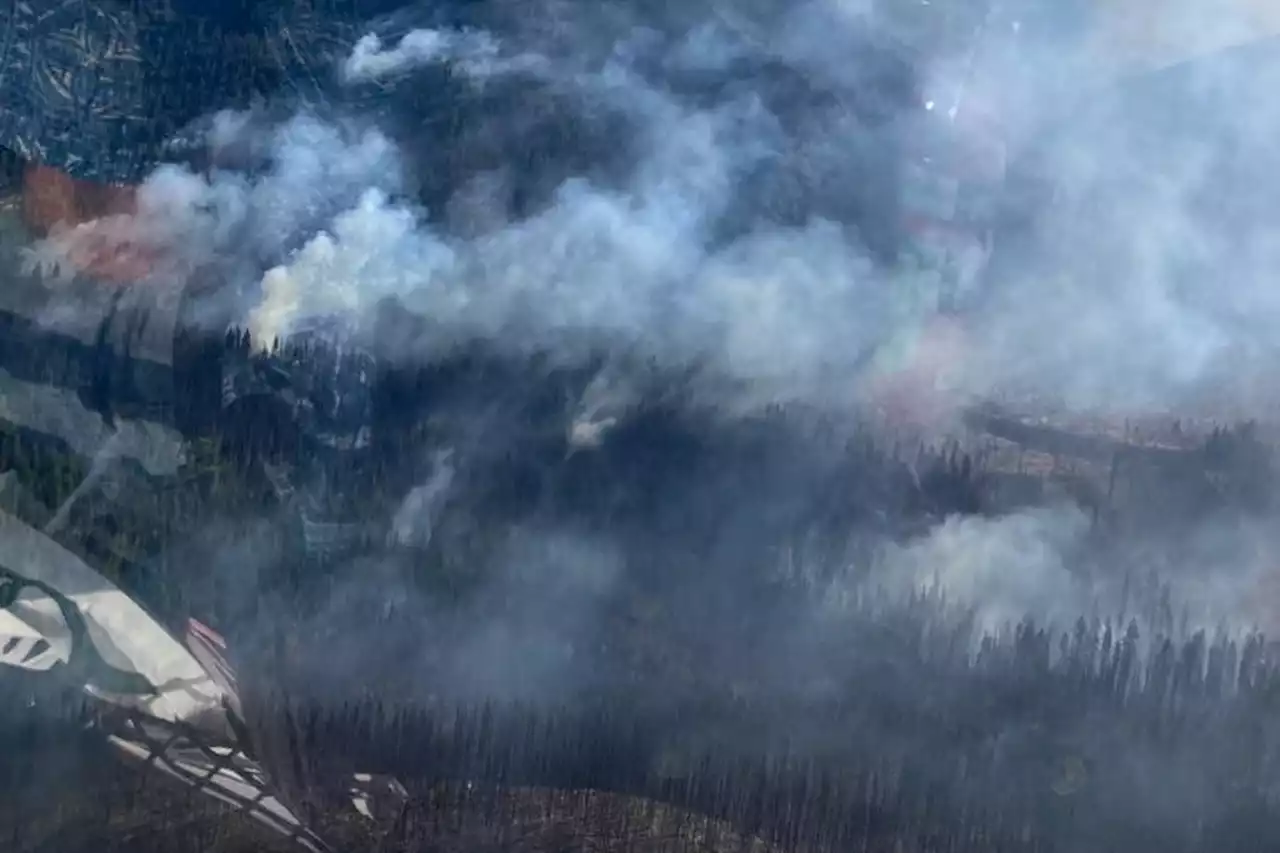 B.C. crews keep close watch on wildfire east of Vancouver as another delays school in northeast