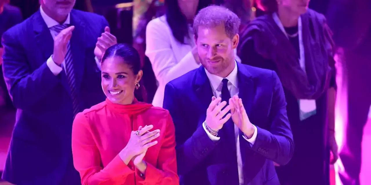 Duchess Meghan Is Vibrant in a Head-to-Toe Crimson Suit