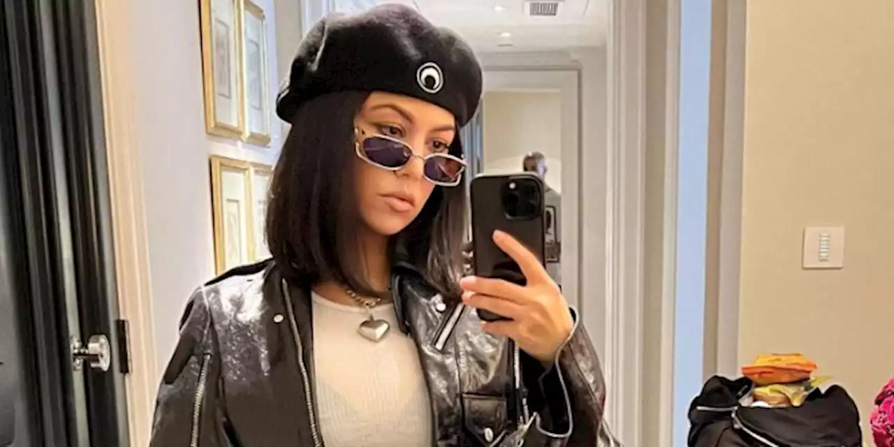 Kourtney Kardashian Paired a Cropped Leather Jacket with Waist-Cutout Trousers