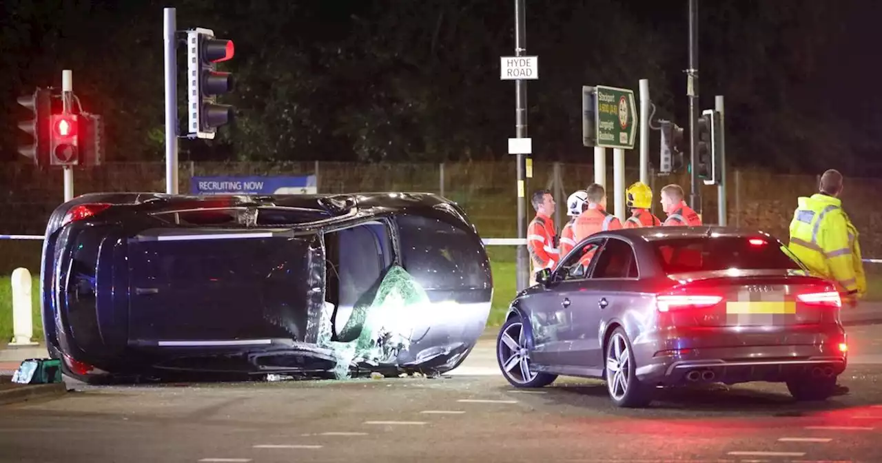 'Banned driver' arrested after car flips over as police chase ends in smash