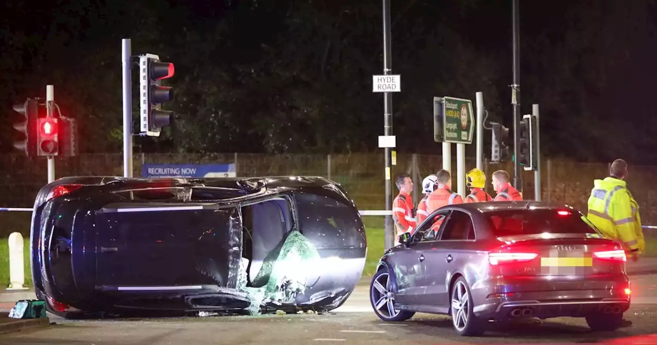 Person rescued from vehicle after car flips over in crash on Hyde Road