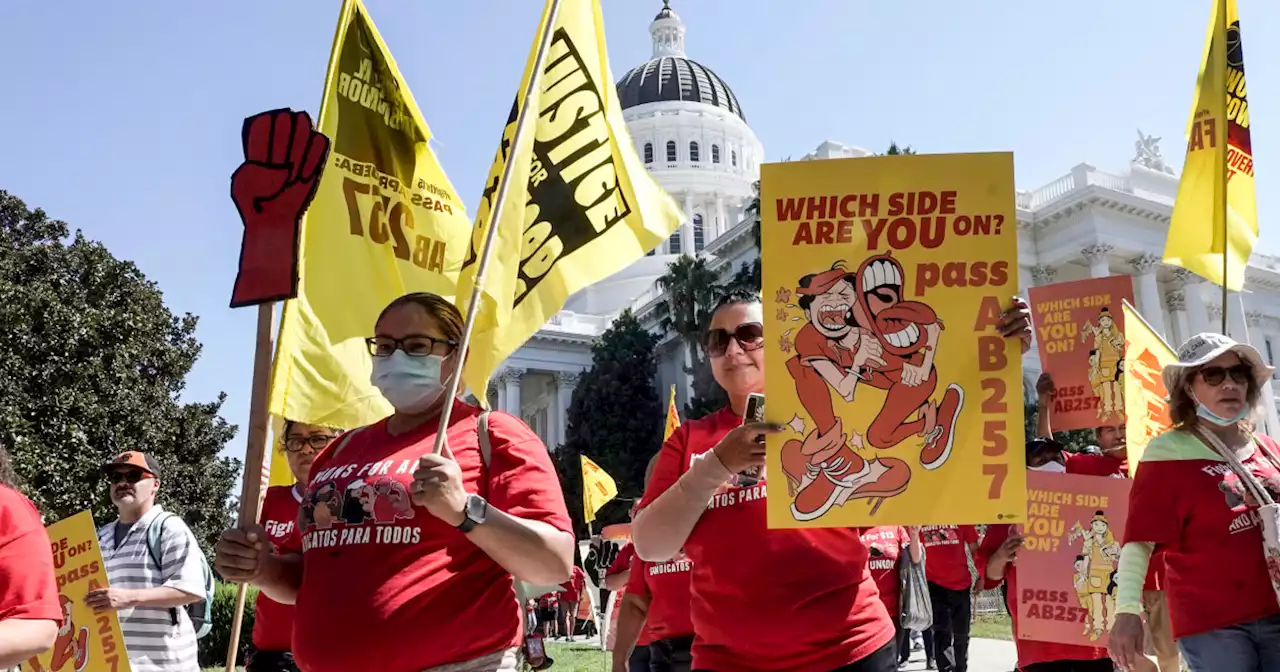 California governor signs landmark law boosting fast-food workers