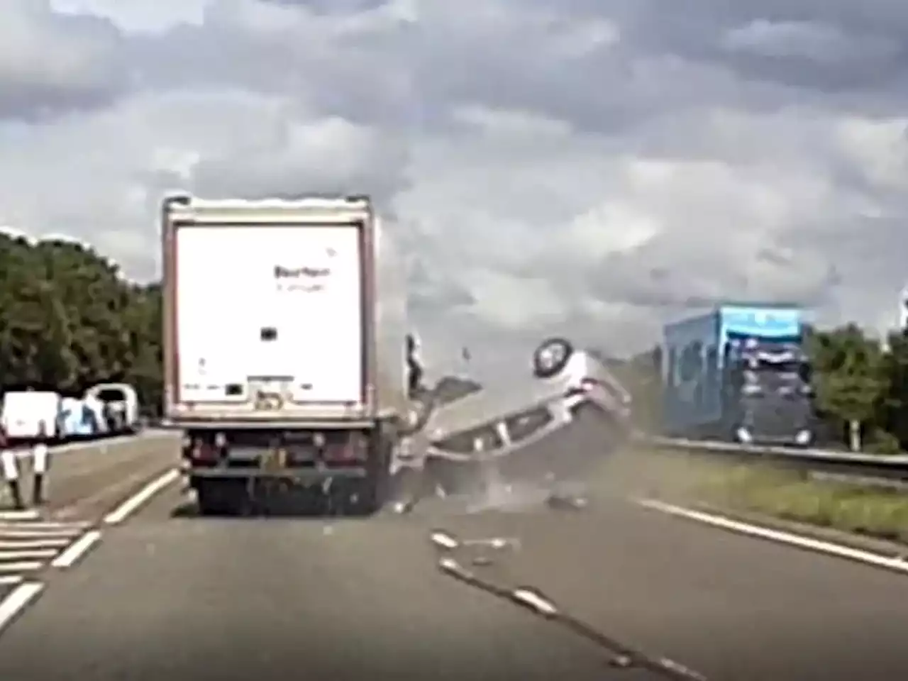 Woman three times over drink-drive limit filmed smashing into lorry and rolling over