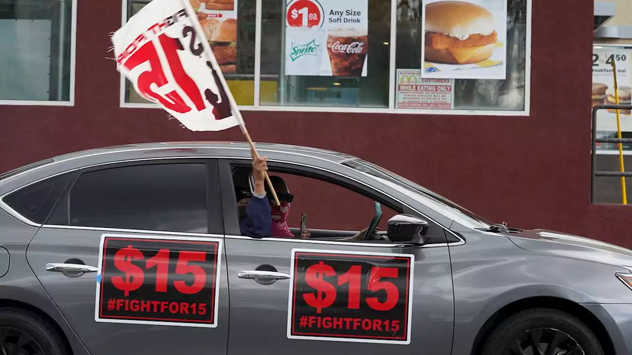 California governor signs landmark law for fast food workers