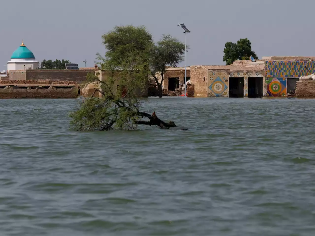 Pakistan's biggest lake bursts its banks, threatening further floods