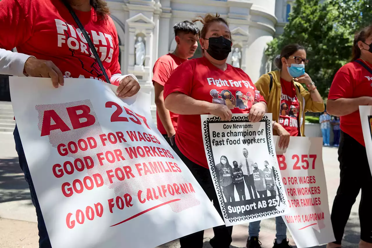 Newsom signs bill to regulate wages for fast food workers