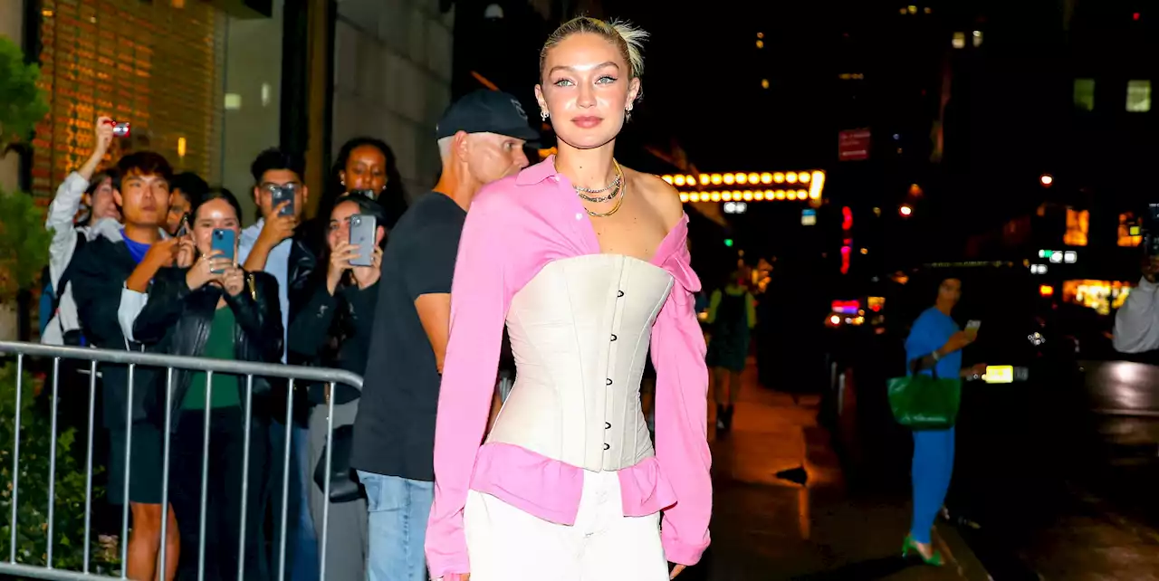 Gigi Hadid Layers a Corset Over a Bubblegum Pink Button-Down