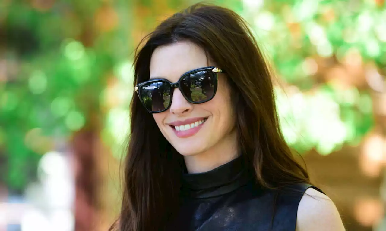 Anne Hathaway's white puff-sleeved dress is the coolest end-of-summer look