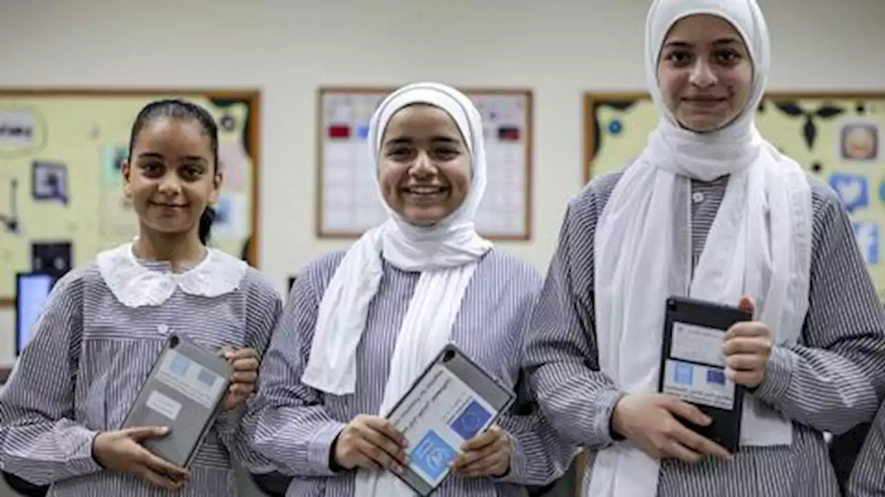 Gaza children receive tablets to connect with world